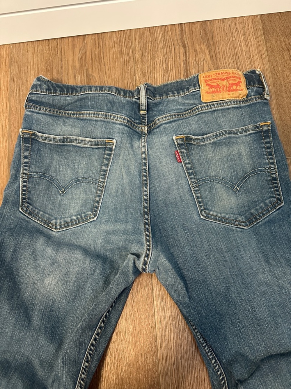 Levi's 502s Taper Fit Blue Denim Jeans with Back Pocket Detail